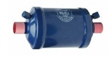 Suction line anti-acid solid core filter dryer